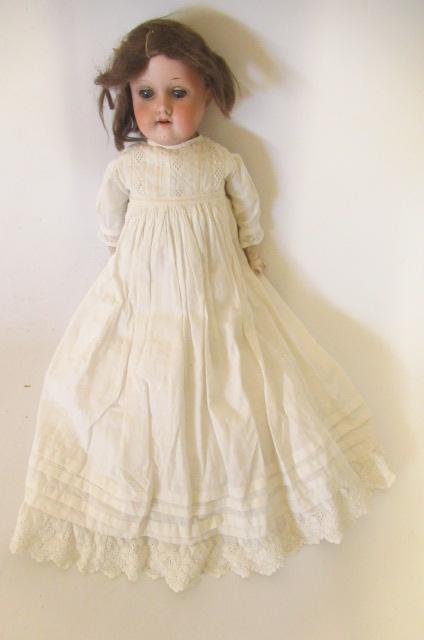 An Armand Marseille bisque shoulder head doll Image