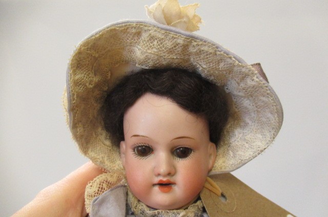 An Armand Marseille bisque socket head doll Image