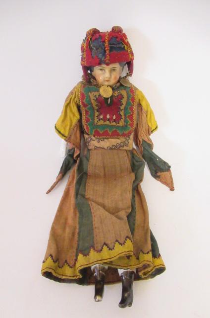 A Victorian china shoulder head doll Image