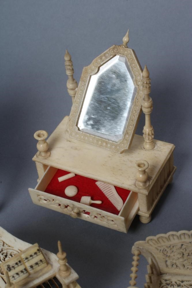 A collection of Victorian bone and ivory doll's house furniture Image