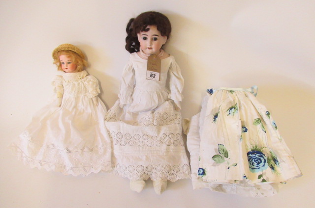Two bisque shoulder head dolls Image