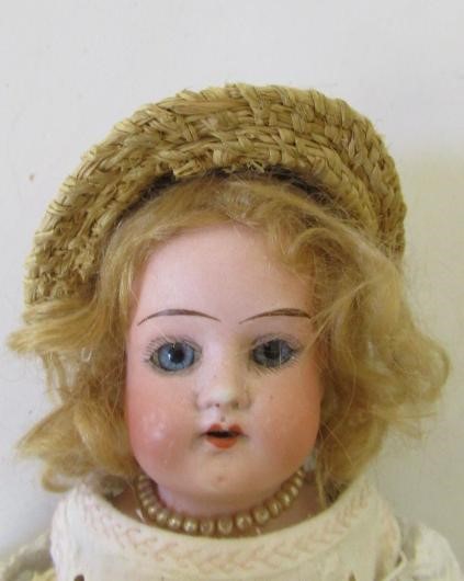 Two bisque shoulder head dolls Image
