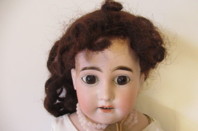 Two bisque shoulder head dolls Image