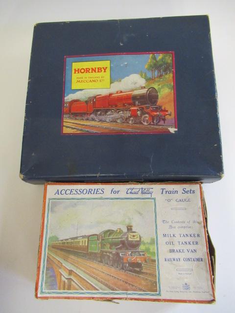 Four Chad Valley goods trucks and Hornby M1 Clockwork Passenger Train Set Image