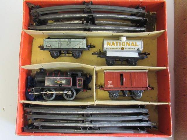 Hornby Clockwork Goods Set No 40 B.R. tank locomotive and three goods trucks and Hornby Clockwork Image