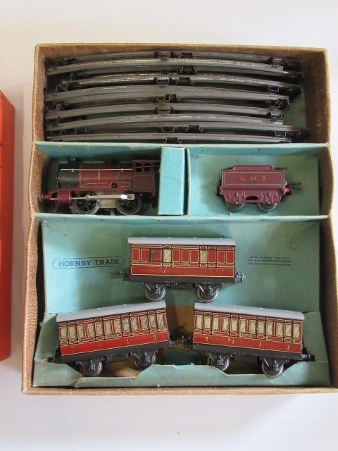 Hornby Clockwork Goods Set No 40 B.R. tank locomotive and three goods trucks and Hornby Clockwork Image