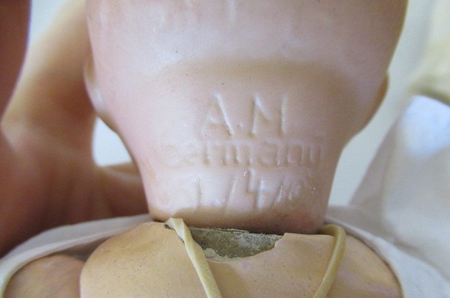 A Heubach Koppelsdorf bisque socket head baby doll Image