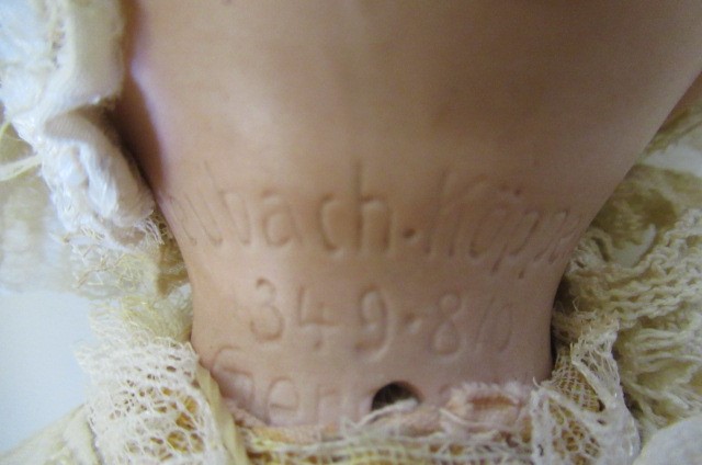 A Heubach Koppelsdorf bisque socket head baby doll Image