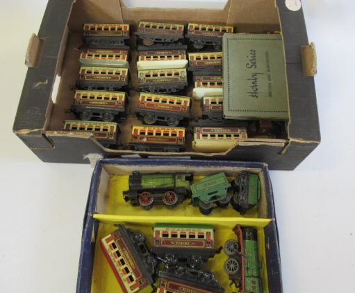 Hornby M1 rolling stock including two clockwork locomotives and a Pullman coach Image