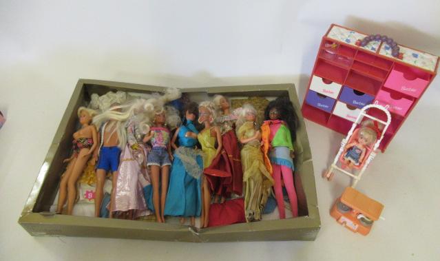 Eight various Barbie dolls and a Ken Image