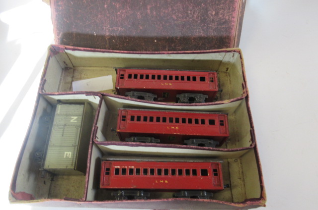 Three Stronlite coaches finished in red with L.M.S. to sides Image
