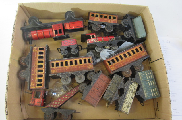 Brimtoy playworn rolling stock including clockwork locomotive and wagons Image