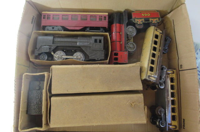 Mettoy electric and clockwork trains including plastic tender locomotive and coaches Image