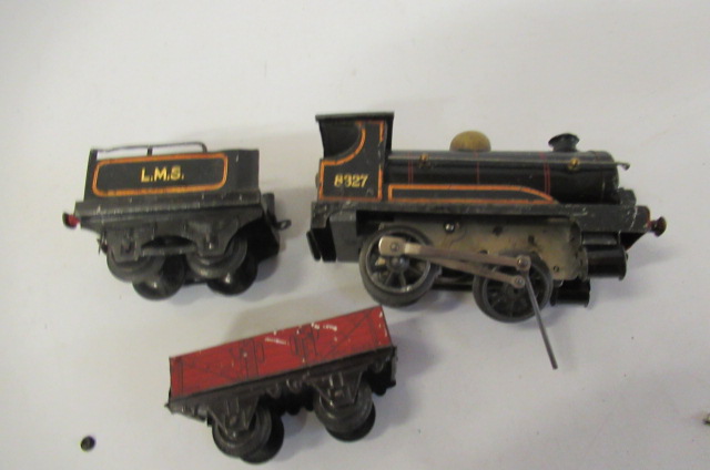 Playworn Hornby clockwork locomotive and tender and a coal wagon Image