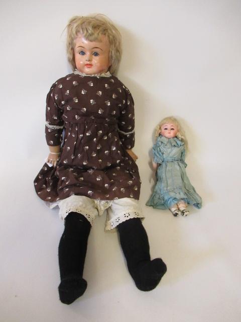 A pre-war composition shoulder head doll Image