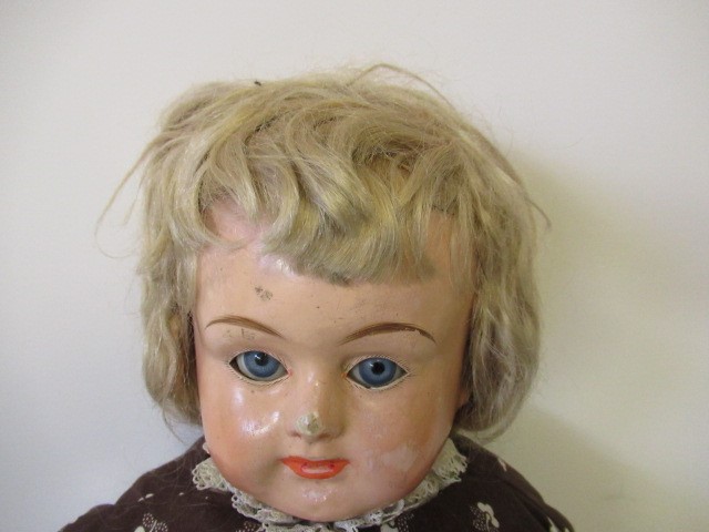 A pre-war composition shoulder head doll Image