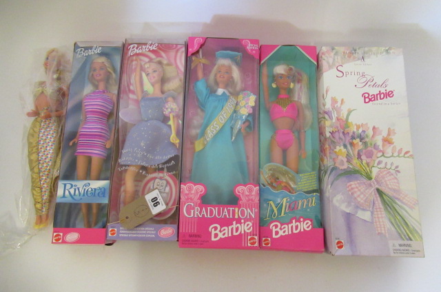 Five boxed Barbie dolls Image