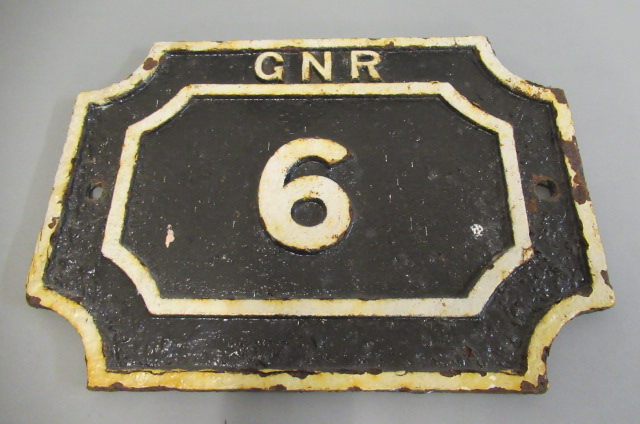 G.N.R. Mile Post with No 6 and G.N.R. in white rusting to face and back of sign Image