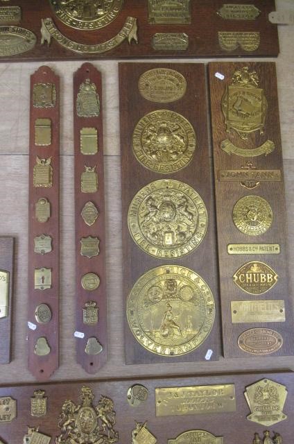 Vintage brass safe lock and manufacturers' plates including Milners' Patent Image