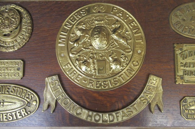 Vintage brass safe lock and manufacturers' plates including Milners' Patent Image
