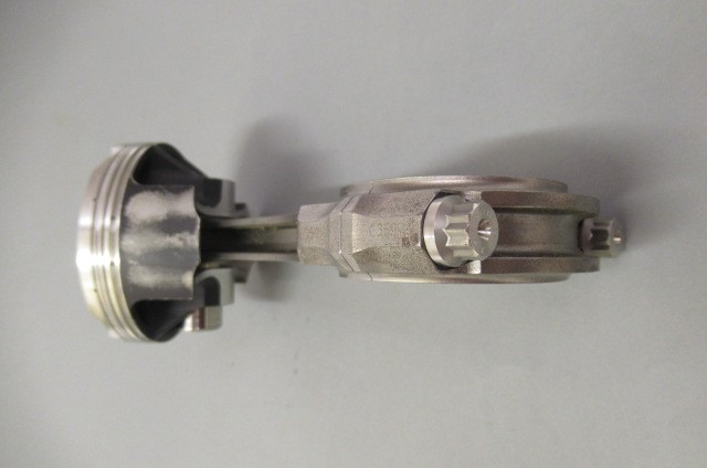 A Pankl McLaren Mercedes Formula One piston and connecting rod removed from 2007 engine for return Image