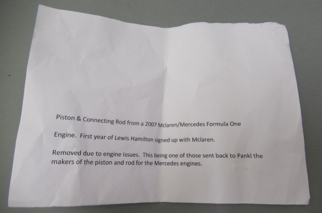 A Pankl McLaren Mercedes Formula One piston and connecting rod removed from 2007 engine for return Image
