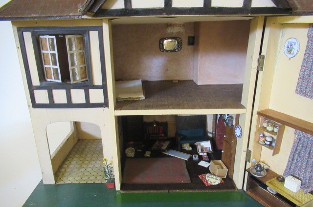 A Triang doll's house and contents Image