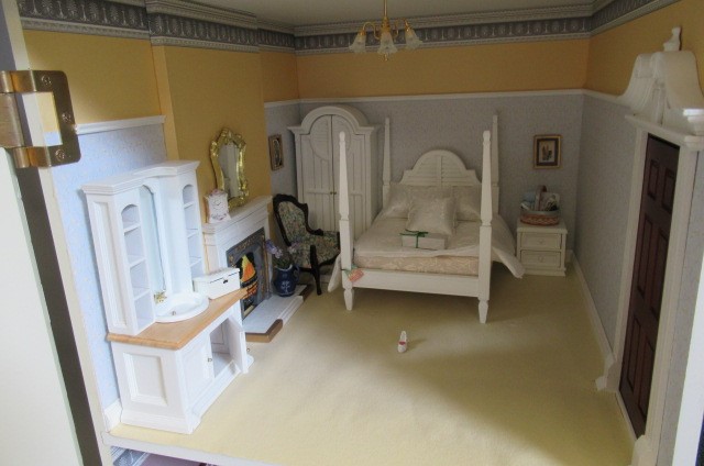 A large Georgian style dolls house Image
