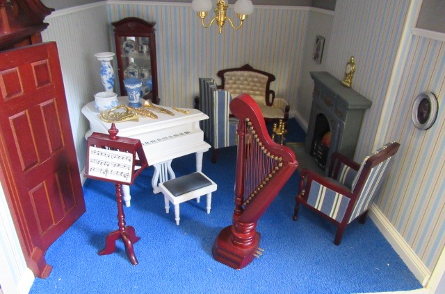A large Georgian style dolls house Image