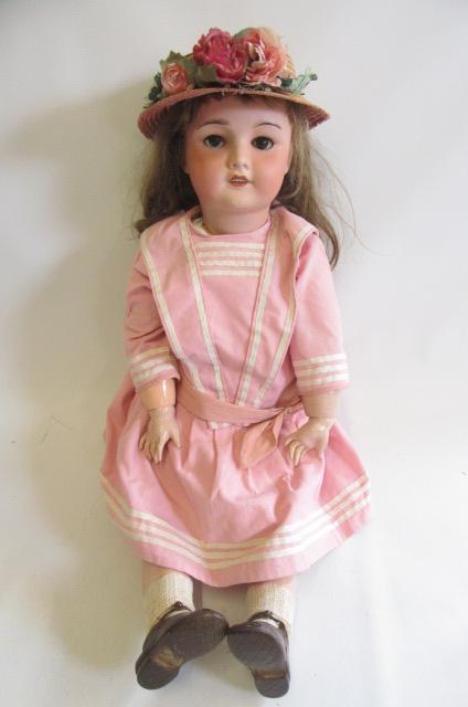 A large German bisque socket head doll Image