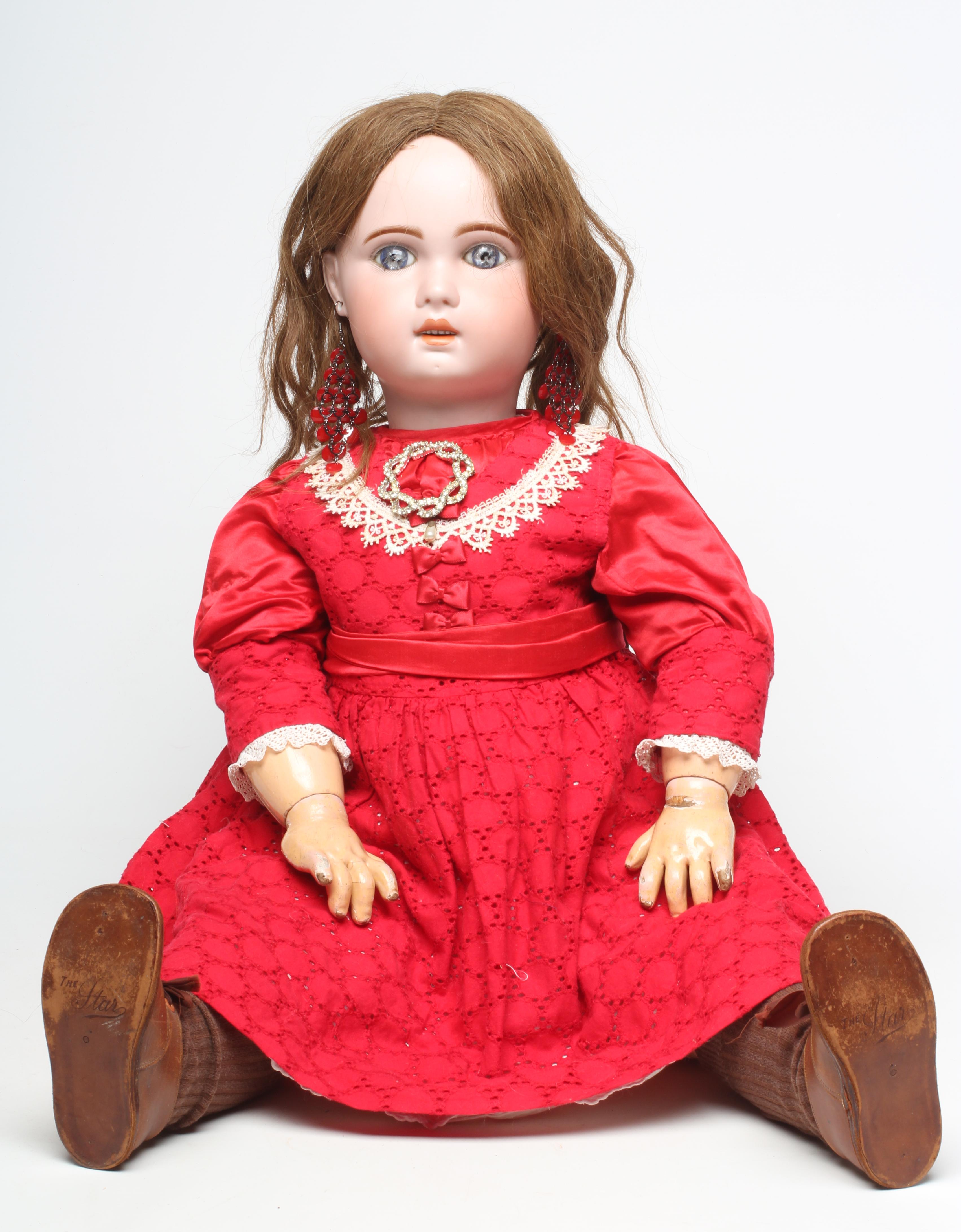 A Bebe Jumeau bisque socket head doll Image