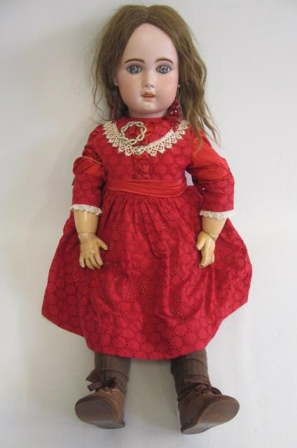 A Bebe Jumeau bisque socket head doll Image