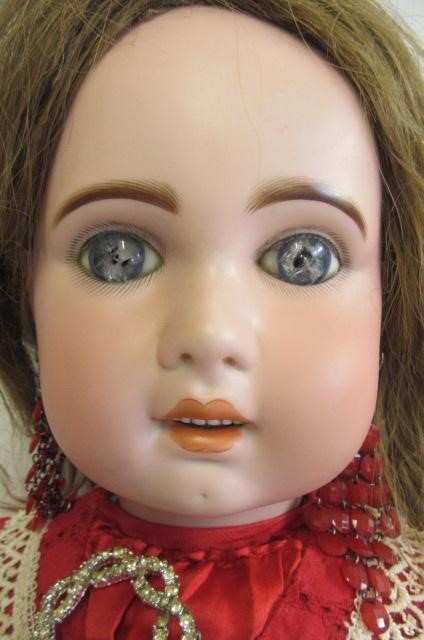 A Bebe Jumeau bisque socket head doll Image