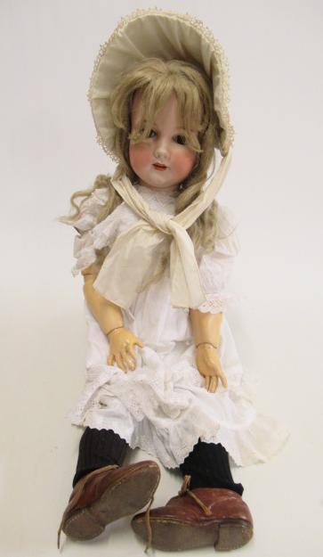 A large Armand Marseille bisque socket head doll Image