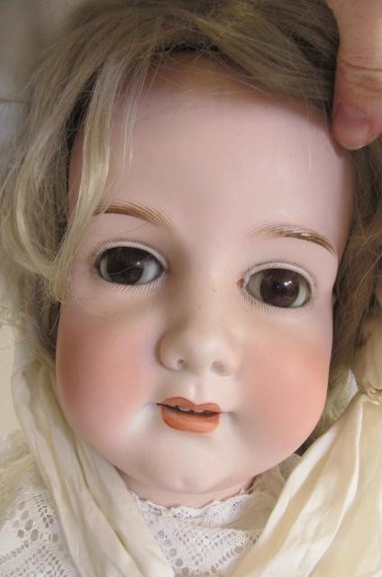 A large Armand Marseille bisque socket head doll Image