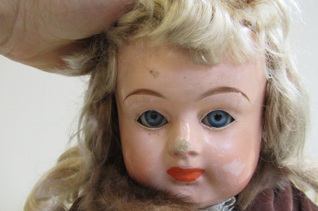 A pre-war all original composition shoulder head doll Image