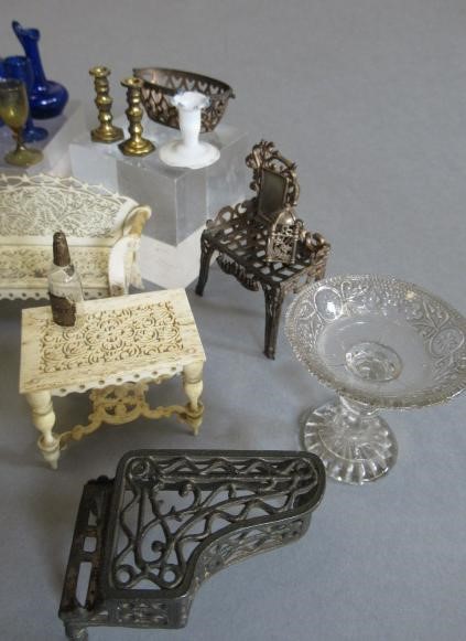 A small collection of dolls house furniture and interior pieces Image