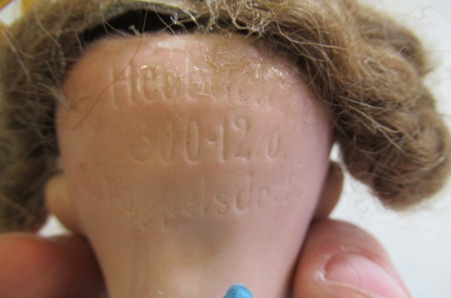 A Heubach bisque socket head doll Image