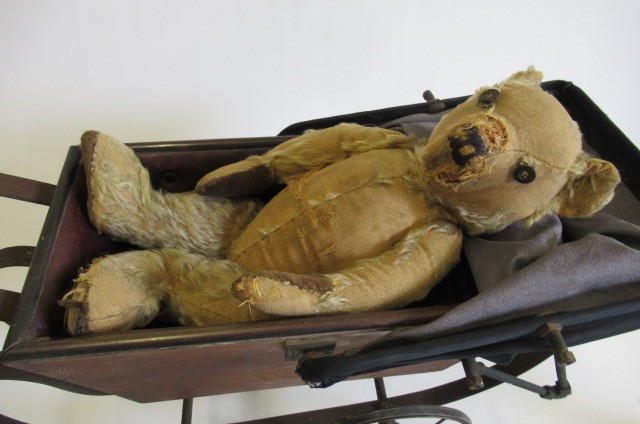 A twin dolls pram Image