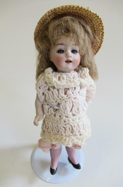An all bisque doll Image