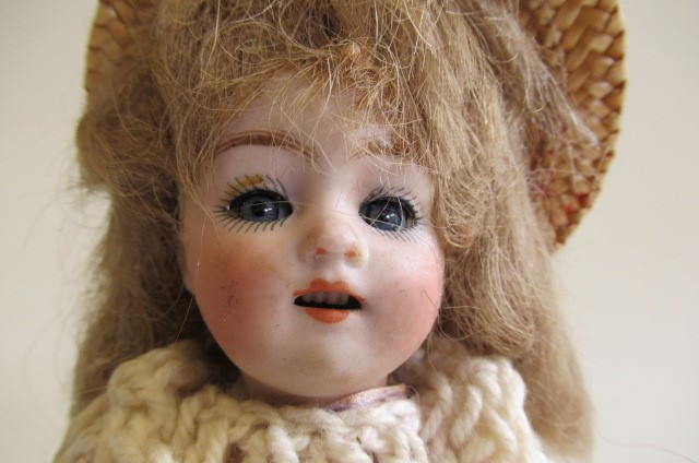 An all bisque doll Image