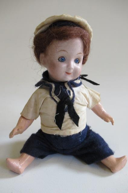A German bisque socket head sailor doll Image