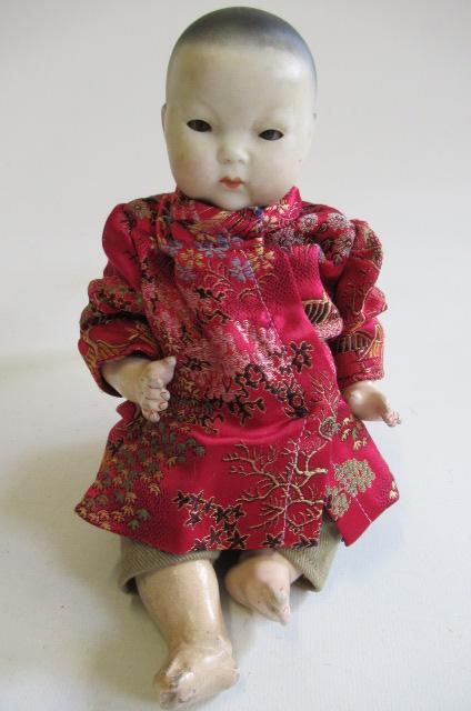 A German Oriental baby bisque head socket doll Image