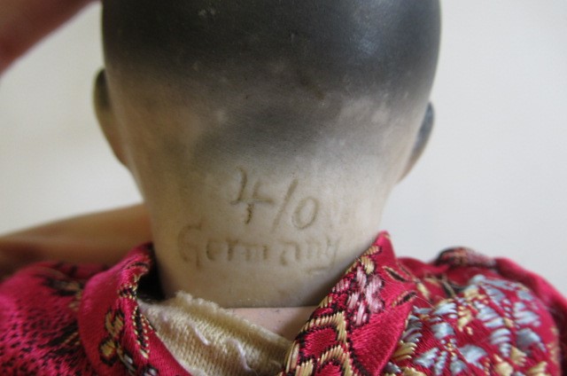 A German Oriental baby bisque head socket doll Image