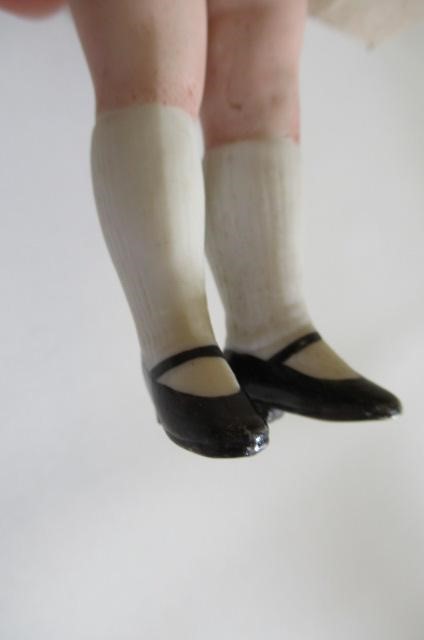 A small German all bisque character doll Image