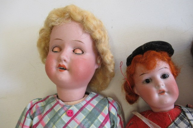 Four German bisque head dolls Image