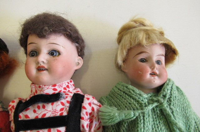 Four German bisque head dolls Image