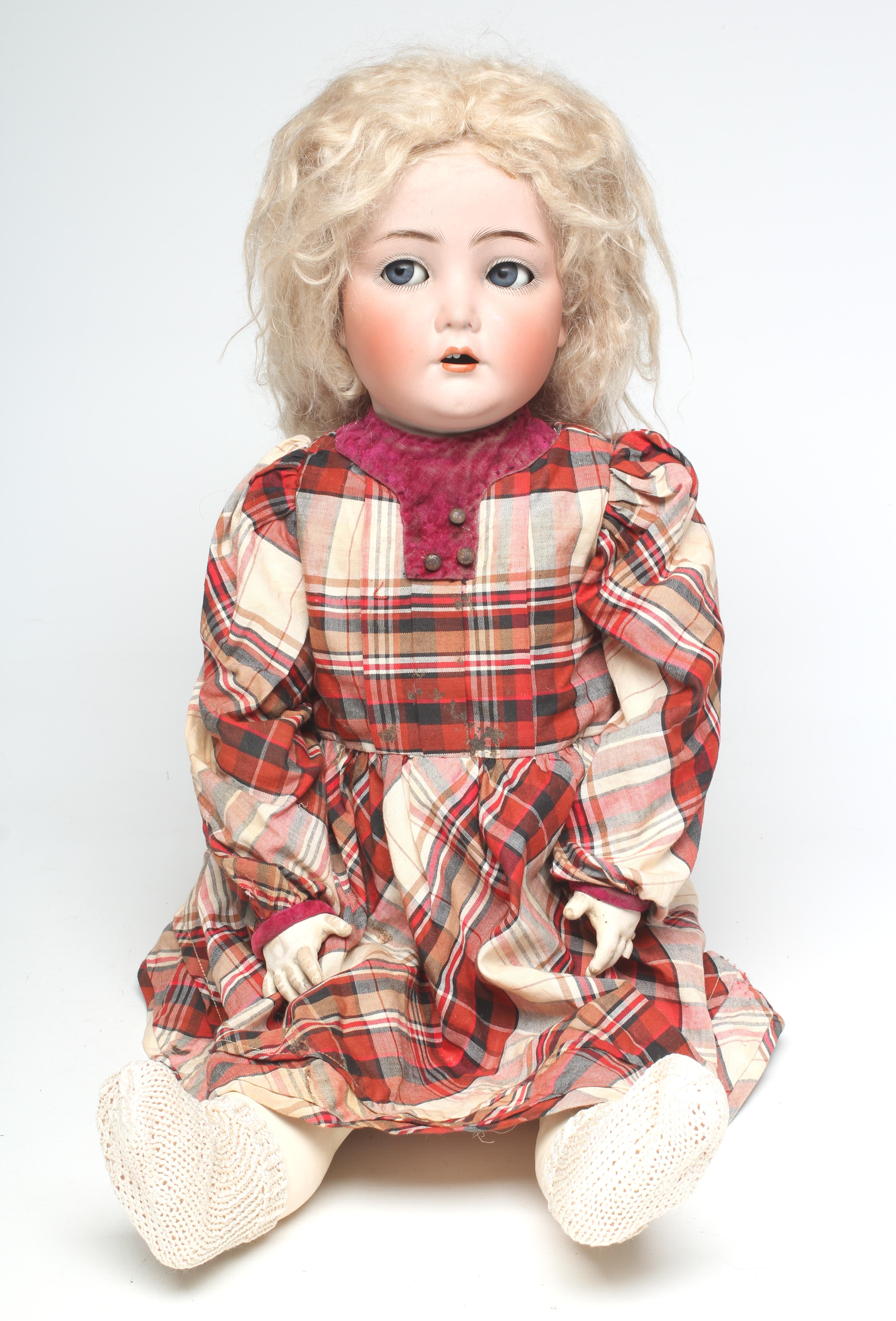 A Kammer & Reinhardt bisque socket head flirty doll Image
