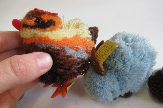 Seven Steiff pom poms Image