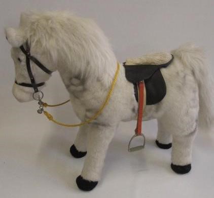 A Merrythought standing pony covered in white fur Image